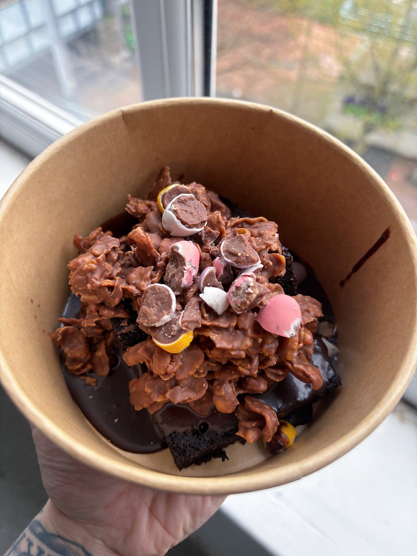 Mini egg chocolate fudge cornflake cake pot in kraft dessert pot